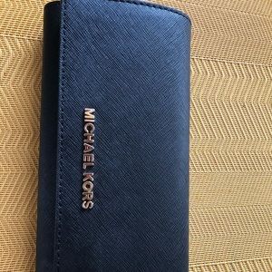 Michael Kors black leather wallet.